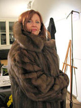A very pleased Russian sable fur coat winner