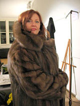 A very pleased Russian sable fur coat winner